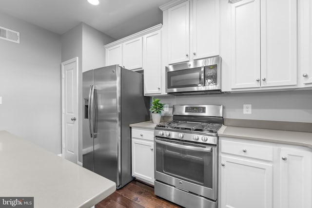 7820 Loblolly Way, Hanover, MD 21076 - kitchen featuring stainless steel appliances, dark wood-style flooring, light countertops, white cabinets, and recessed lighting