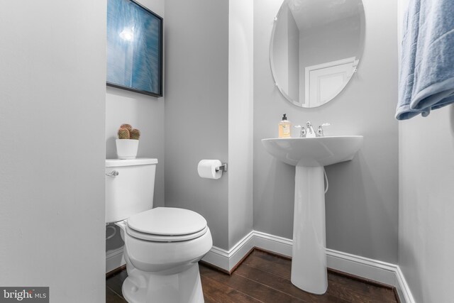 7820 Loblolly Way, Hanover, MD 21076 - bathroom with wood finished floors, toilet, and baseboards