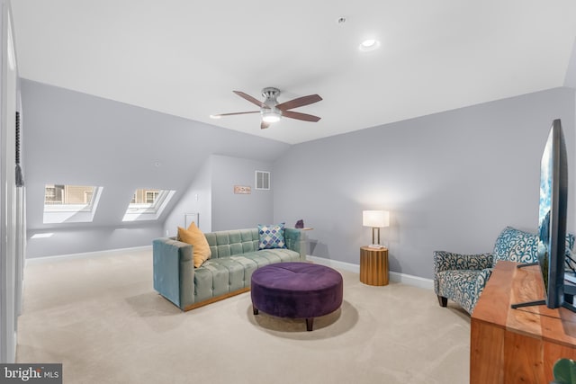 7820 Loblolly Way, Hanover, MD 21076 - carpeted living room featuring a skylight, vaulted ceiling, baseboards, and a ceiling fan