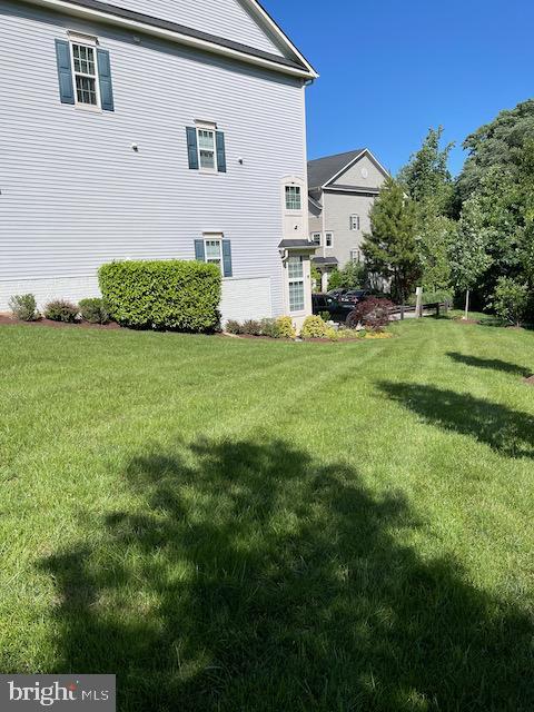 7820 Loblolly Way, Hanover, MD 21076 - view of side of home featuring a yard