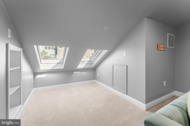 7820 Loblolly Way, Hanover, MD 21076 - bonus room featuring a skylight, baseboards, carpet, and vaulted ceiling