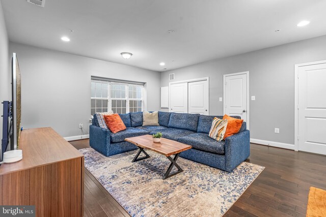 7820 Loblolly Way, Hanover, MD 21076 - living area with dark wood finished floors, baseboards, and recessed lighting
