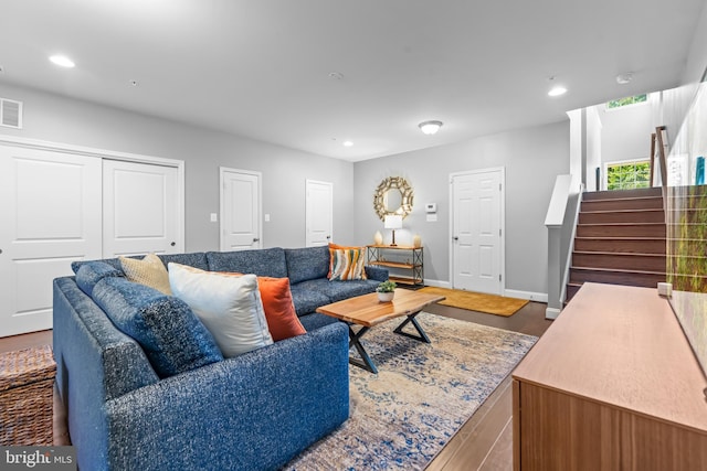 7820 Loblolly Way, Hanover, MD 21076 - living area with stairway, wood finished floors, recessed lighting, and baseboards
