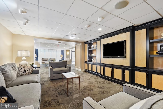 4601 N Park Ave Unit 514, Chevy Chase, MD 20815 - living room with carpet flooring, a paneled ceiling, and baseboards