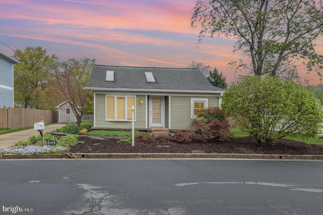 1616 S Oakland St, Arlington, VA 22204 - view of front of property with fence, driveway, and roof with shingles