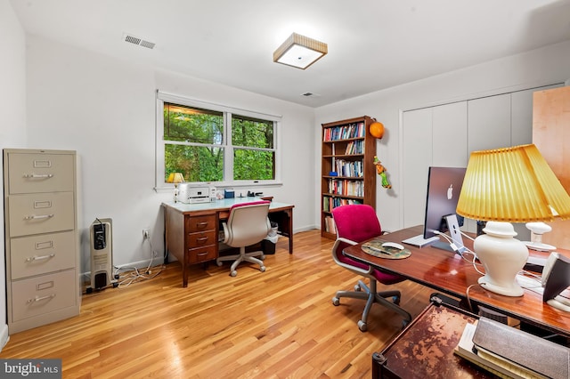 office area with light wood finished floors
