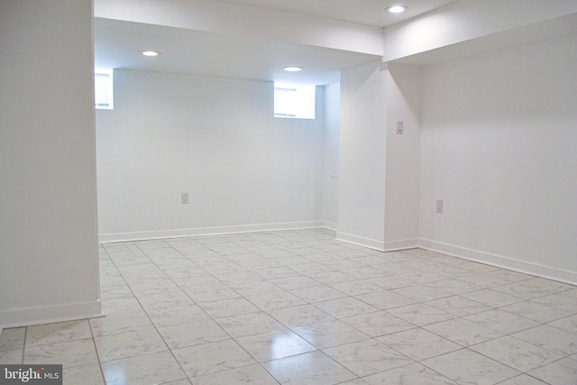 1406 S 28th St, Philadelphia, PA 19146 - below grade area with recessed lighting, baseboards, and light marble finish floors