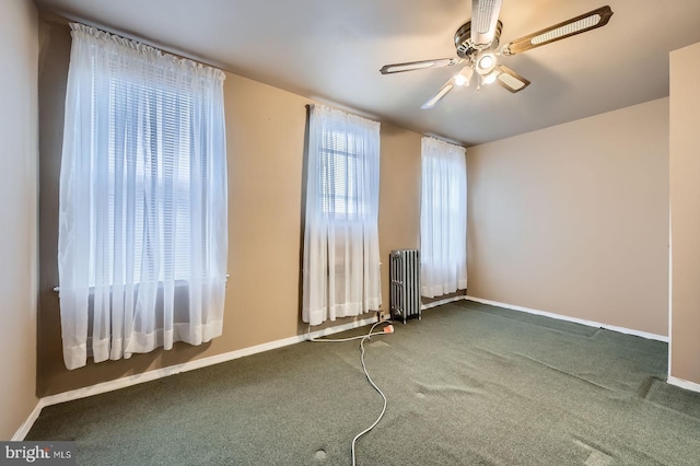 23 N Morley St, Baltimore, MD 21229 - carpeted empty room featuring baseboards, radiator, and ceiling fan