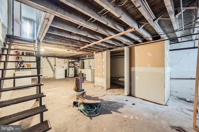 23 N Morley St, Baltimore, MD 21229 - unfinished basement with washer / clothes dryer and water heater