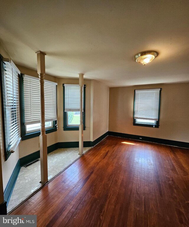 49 Front St, Wyoming, DE 19934 - spare room featuring wood-type flooring and baseboards