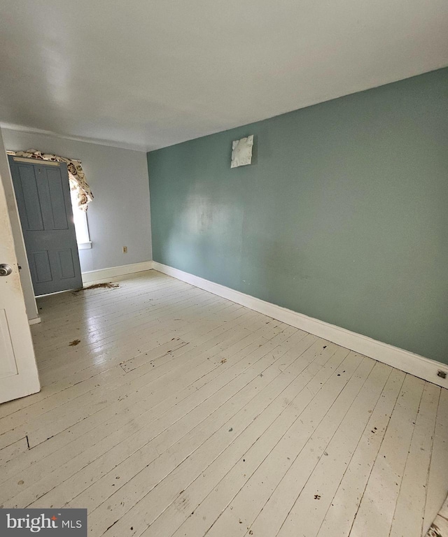 49 Front St, Wyoming, DE 19934 - unfurnished room featuring wood-type flooring and baseboards