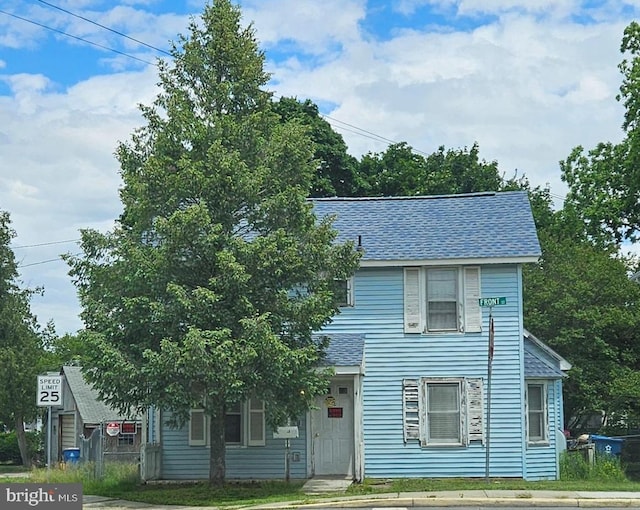 49 Front St, Wyoming, DE 19934 - view of front of home with a shingled roof