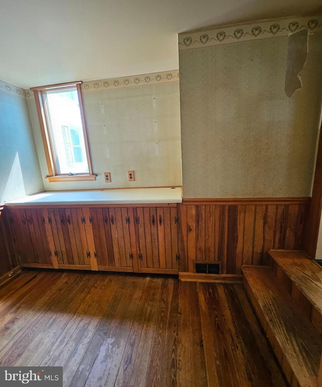 49 Front St, Wyoming, DE 19934 - spare room with dark wood-style flooring