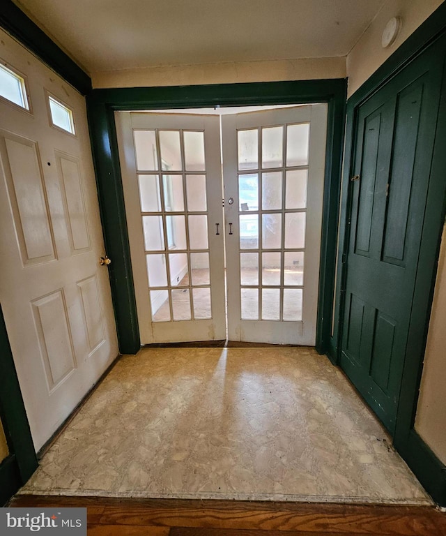 49 Front St, Wyoming, DE 19934 - entrance foyer featuring french doors and tile patterned floors