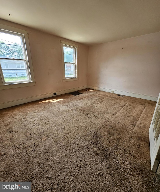 49 Front St, Wyoming, DE 19934 - empty room with carpet and baseboards
