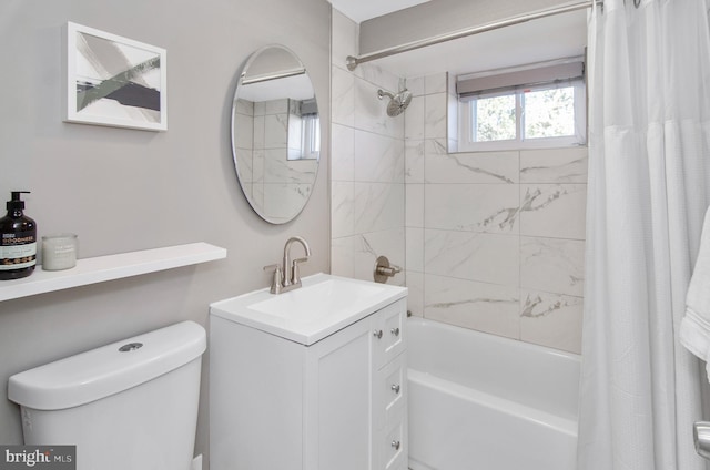 bathroom with toilet, shower / bath combo, and vanity