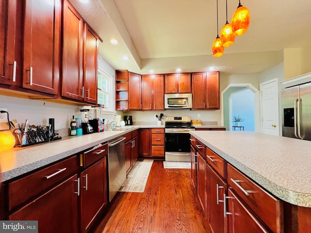 10400 Markby Ct, White Plains, MD 20695 - kitchen featuring appliances with stainless steel finishes, dark wood-style flooring, a sink, light countertops, and recessed lighting