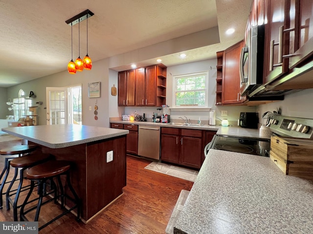10400 Markby Ct, White Plains, MD 20695 - kitchen featuring open shelves, appliances with stainless steel finishes, a sink, a textured ceiling, and dark wood finished floors