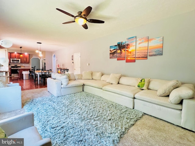 10400 Markby Ct, White Plains, MD 20695 - living room featuring a ceiling fan and arched walkways