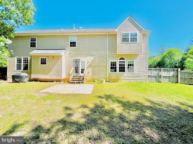 10400 Markby Ct, White Plains, MD 20695 - rear view of property featuring entry steps and a patio area