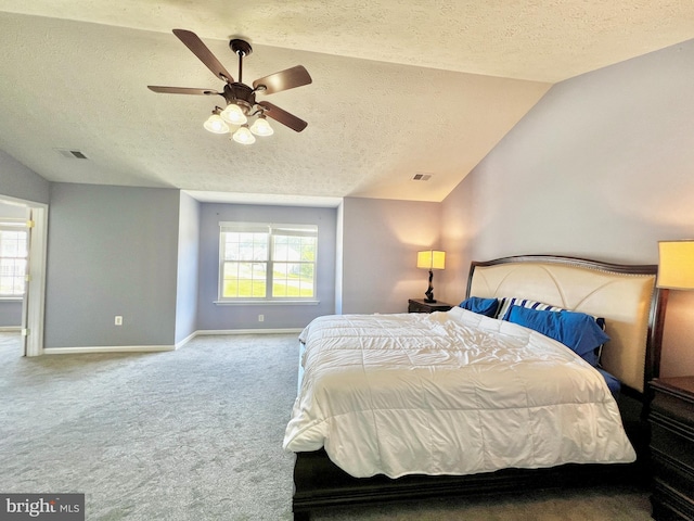 10400 Markby Ct, White Plains, MD 20695 - bedroom featuring a textured ceiling, carpet floors, baseboards, multiple windows, and a ceiling fan