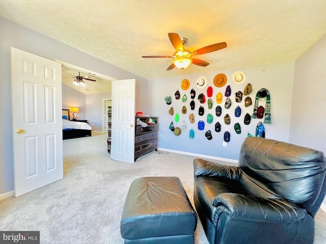 10400 Markby Ct, White Plains, MD 20695 - sitting room with ceiling fan, light colored carpet, baseboards, and a textured ceiling