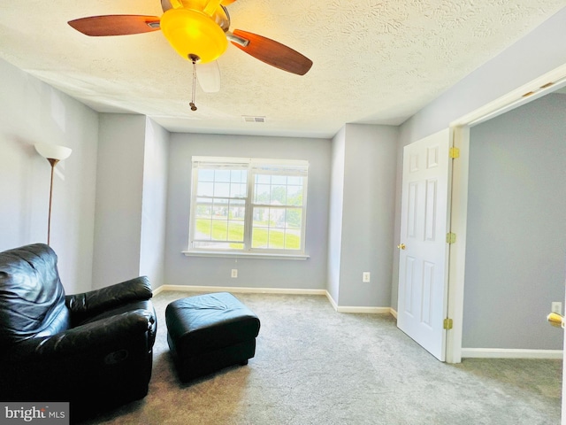 10400 Markby Ct, White Plains, MD 20695 - sitting room with carpet, ceiling fan, baseboards, and a textured ceiling