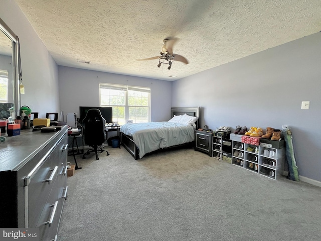10400 Markby Ct, White Plains, MD 20695 - carpeted bedroom with a desk, a textured ceiling, and ceiling fan