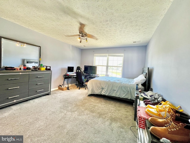 10400 Markby Ct, White Plains, MD 20695 - bedroom with carpet, a desk, a textured ceiling, and a ceiling fan
