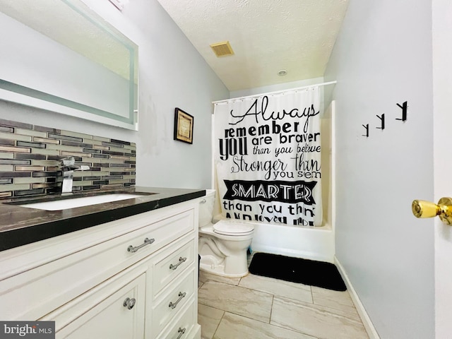 10400 Markby Ct, White Plains, MD 20695 - full bath featuring backsplash, marble look tiles, toilet, vanity, and shower / bath combination with curtain