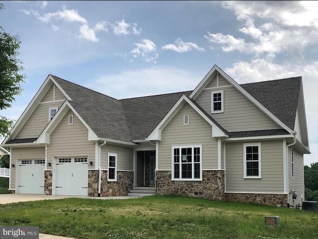 320 Linden Dr, Winchester, VA 22601 - craftsman-style home featuring central AC unit, a front lawn, roof with shingles, and concrete driveway