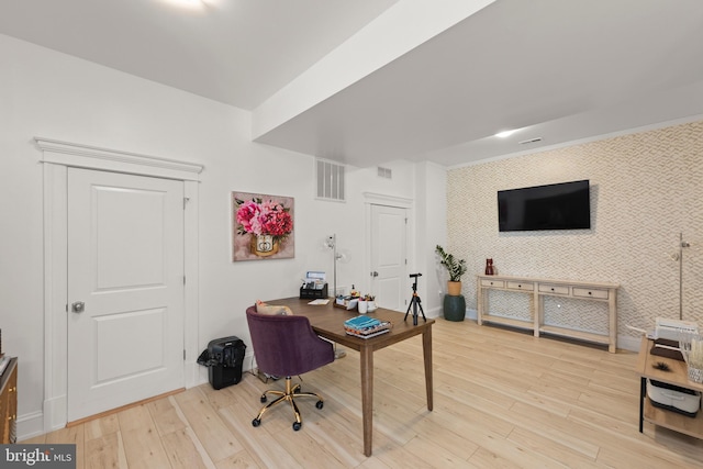 320 Linden Dr, Winchester, VA 22601 - home office with wallpapered walls, an accent wall, light wood-type flooring, and baseboards