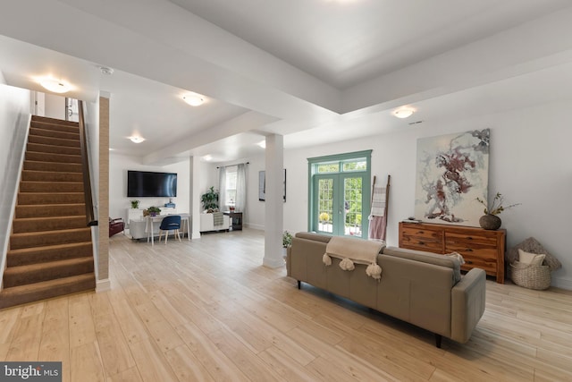 320 Linden Dr, Winchester, VA 22601 - living room featuring stairway, light wood finished floors, and baseboards