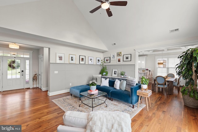 320 Linden Dr, Winchester, VA 22601 - living area with healthy amount of natural light, high vaulted ceiling, a ceiling fan, and wood finished floors