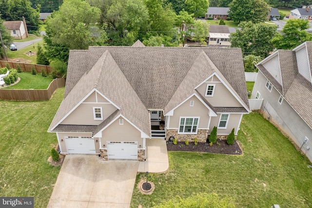 320 Linden Dr, Winchester, VA 22601 - view of front of home with stone siding, a garage, roof with shingles, and concrete driveway