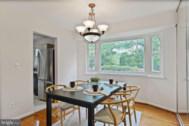 3702 Forest Grove Dr, Annandale, VA 22003 - dining space with healthy amount of natural light, baseboards, and light wood-type flooring