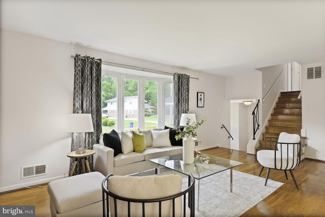 3702 Forest Grove Dr, Annandale, VA 22003 - living room featuring stairs, wood finished floors, and baseboards