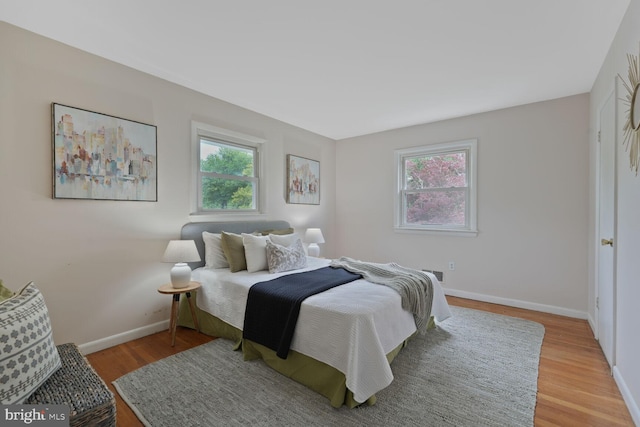 3702 Forest Grove Dr, Annandale, VA 22003 - bedroom with baseboards and light wood-style floors