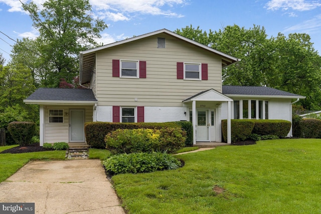 3702 Forest Grove Dr, Annandale, VA 22003 - view of front of home with a front lawn, brick siding, and a shingled roof
