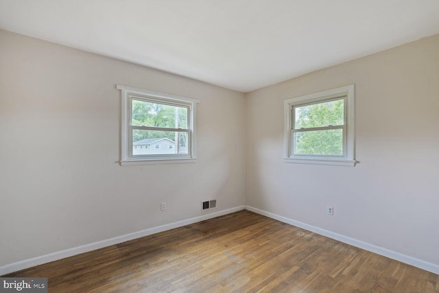 3702 Forest Grove Dr, Annandale, VA 22003 - spare room with plenty of natural light, baseboards, and wood finished floors