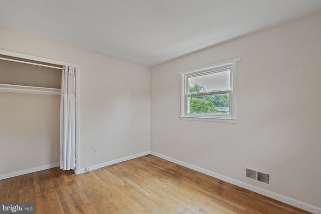 3702 Forest Grove Dr, Annandale, VA 22003 - unfurnished bedroom featuring baseboards, wood finished floors, and a closet