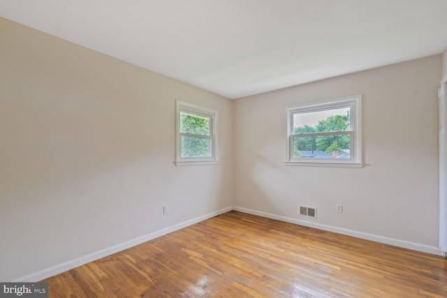 3702 Forest Grove Dr, Annandale, VA 22003 - spare room featuring baseboards and light wood-style flooring