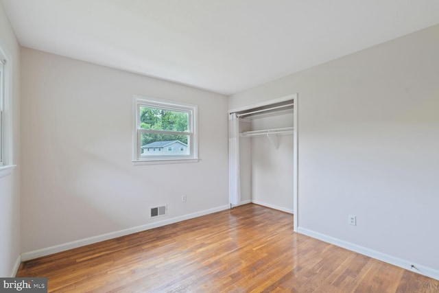 3702 Forest Grove Dr, Annandale, VA 22003 - unfurnished bedroom featuring baseboards, wood finished floors, and a closet