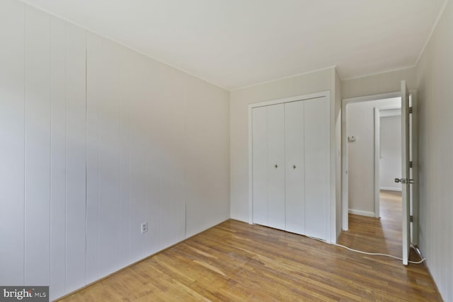 3702 Forest Grove Dr, Annandale, VA 22003 - unfurnished bedroom with wood finished floors and a closet