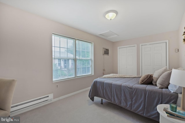 3702 Forest Grove Dr, Annandale, VA 22003 - carpeted bedroom featuring attic access, a baseboard radiator, two closets, baseboards, and a wall mounted AC