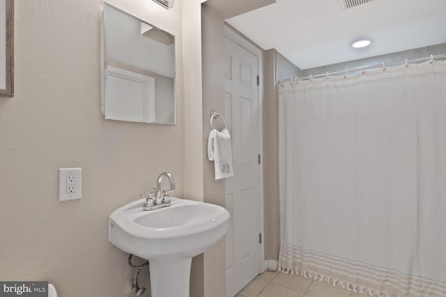 3702 Forest Grove Dr, Annandale, VA 22003 - full bathroom with tile patterned floors, a sink, and a shower with shower curtain