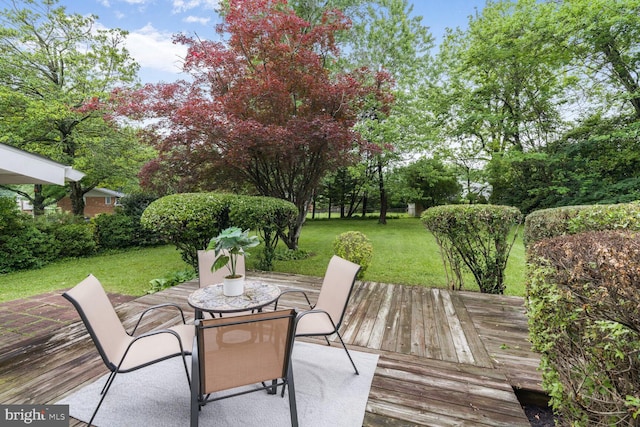 3702 Forest Grove Dr, Annandale, VA 22003 - deck with outdoor dining area, a yard, and view of wooded area