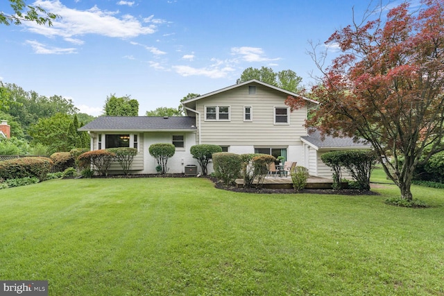 3702 Forest Grove Dr, Annandale, VA 22003 - back of house with a lawn, a wooden deck, and central AC