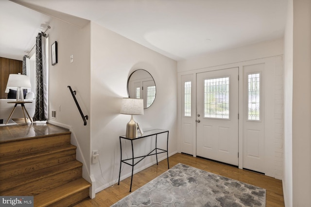 3702 Forest Grove Dr, Annandale, VA 22003 - entryway with wood finished floors, stairway, and baseboards