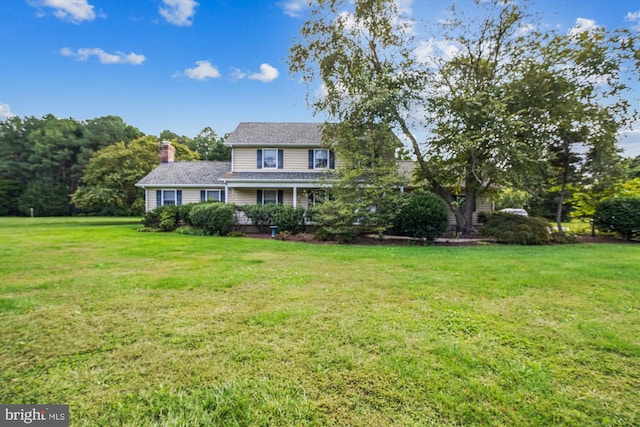 24749 Swan Rd, Saint Michaels, MD 21663 - traditional home featuring a front yard and a chimney